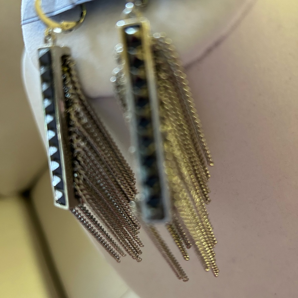 Jennifer Lopez silver tone earrings